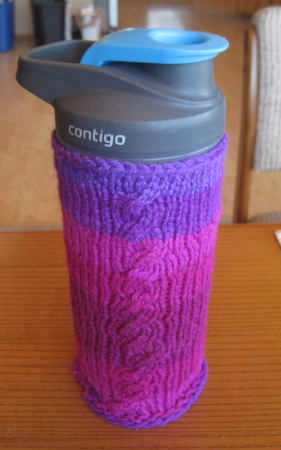 [knitted water bottle cozy with cables]