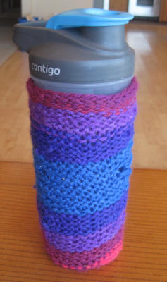 [First, messy knit water bottle cozy]