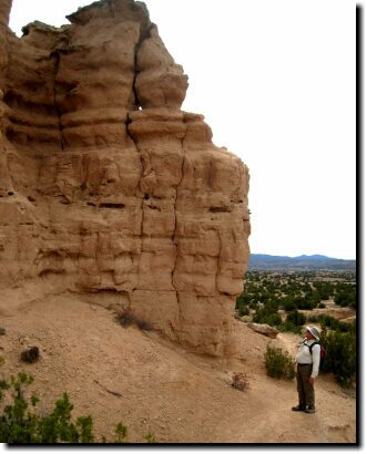 [Ken inspects a Nambe Badlands formation]