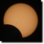 [early stage of annular eclipse 2012, showing sunspots]