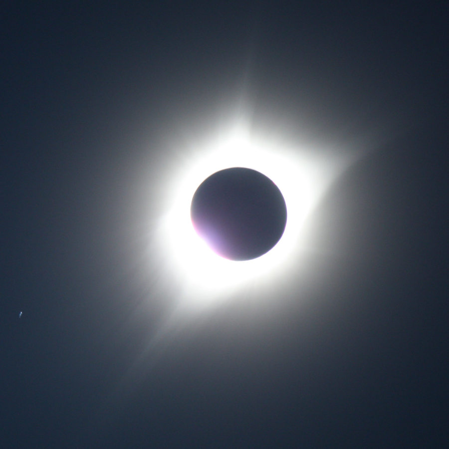 [Solar eclipse diamond ring]