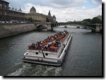 [ Huge tour boats on the Seine. ]