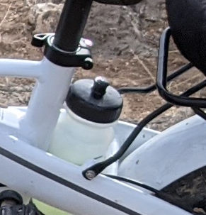 [water bottle carrier on the Lectric XP seat stays]