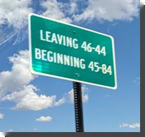 [Sign: LEAVING 46-44 BEGINNING 45-84]