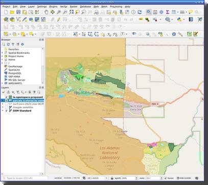 [Screenshot of QGIS showing openspace parcels that have proposed changes]