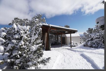 [snow on old stable]