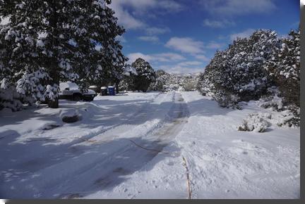 [long tracks shoveled in snow]