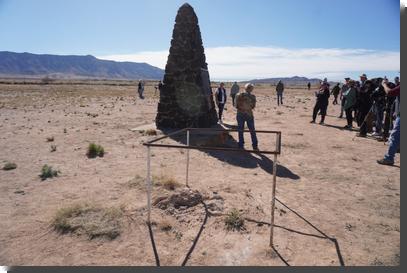 [The monument at Trinity Site, with a structure of rebar in the foreground]