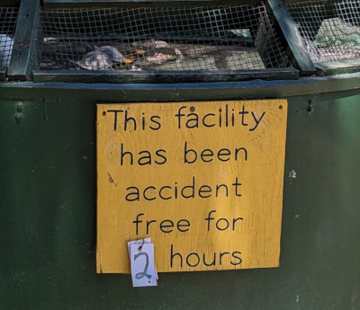 [Sign: This facility has been accident free for [2] hours]