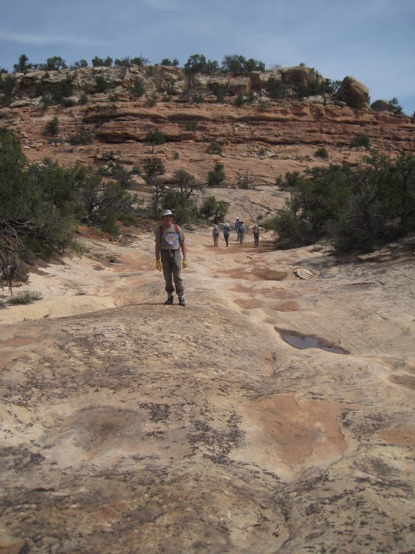 [Hiking through a potholed ...]