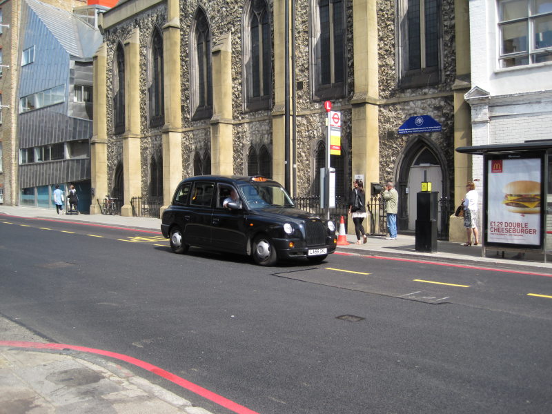 [Those great London taxis.]